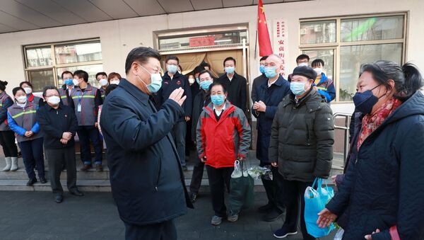 Chinese President Xi Jinping inspects the novel coronavirus prevention and control work at Anhuali Community in Beijing, China, February 10, 2020. Xinhua via REUTERS - Sputnik International