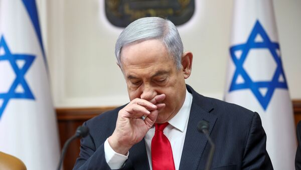 Israeli Prime Minister Benjamin Netanyahu gestures as he chairs the weekly cabinet meeting in Jerusalem, March 8, 2020. - Sputnik International