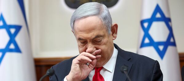 Israeli Prime Minister Benjamin Netanyahu gestures as he chairs the weekly cabinet meeting in Jerusalem, March 8, 2020. - Sputnik International
