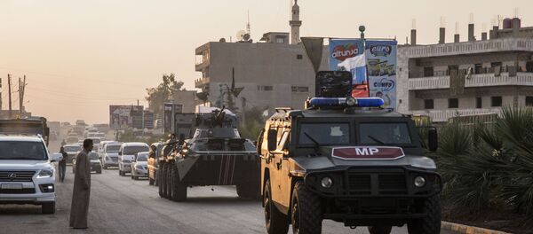 Russian forces in the city of Amuda, north Syria Russian forces in the city of Amuda, north Syria - Sputnik International