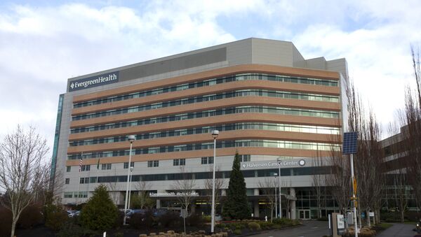 The EvergreenHealth Medical Center is seen on the morning of March 8, 2020 in Kirkland, Washington. Many of the deaths that occurred as a result of the novel coronavirus, COVID-19 outbreak happened here.   - Sputnik International