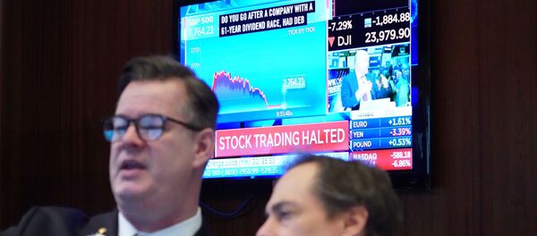 Traders work on the floor of the New York Stock Exchange (NYSE) in New York, U.S., March 9, 2020 - Sputnik International