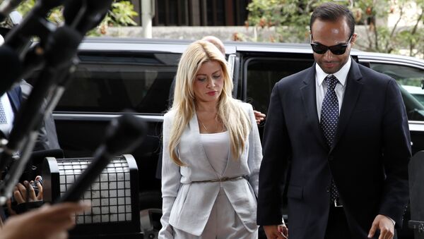 Former Donald Trump presidential campaign foreign policy adviser George Papadopoulos, right, who pleaded guilty to one count of making false statements to the FBI during the agency's Russia probe, holds hands with his wife Simona Mangiante, as they arrive at federal court for sentencing, Friday, Sept. 7, 2018, in Washington. - Sputnik International