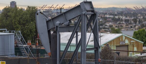 Pump jacks draw crude oil from the Long Beach Oil Field in Signal Hill, California, on March 9, 2020. Pump jacks draw crude oil from the Long Beach Oil Field in Signal Hill, California, on March 9, 2020. - Sputnik International