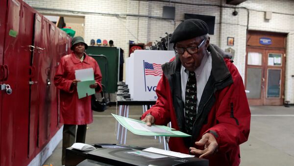 Voters cast their ballots in the Democratic primary election in Detroit, Michigan, U.S., March 10, 2020. - Sputnik International