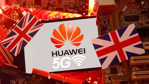 The British flag and a smartphone with a Huawei and 5G network logo are seen on a PC motherboard in this illustration picture taken January 29, 2020.  - Sputnik International