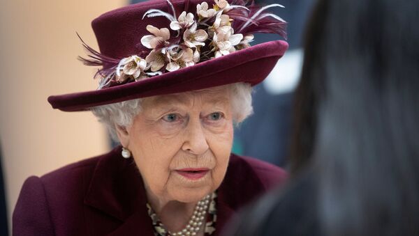 Britain's Queen Elizabeth II talks with MI5 officers during a visit to the headquarters of MI5, which is the United Kingdom's domestic counter-intelligence and security agency, at Thames House in London, Britain February 25, 2020. - Sputnik International