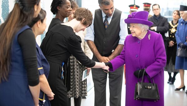 Britain's Queen Elizabeth visits the new premises of the Royal National ENT and Eastman Dental Hospitals in London - Sputnik International