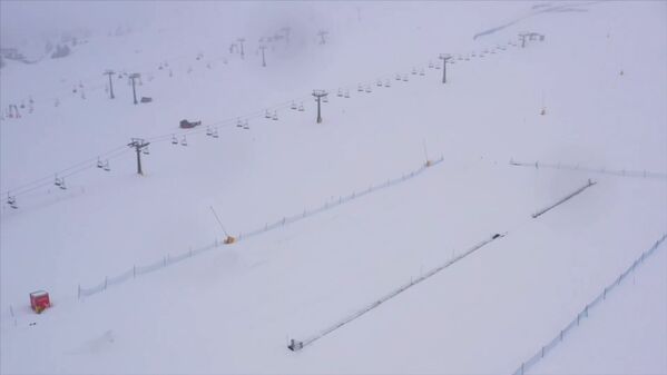 Empty ski lifts are seen at a ski resort in the Lombardy side of the Passo del Tonale, which lies between the Italian regions of Lombardy and Trentino, after it was closed due to strict government measures to try and contain a coronavirus outbreak, in this still image taken from video at Passo del Tonale, Italy, March 9, 2020 - Sputnik International