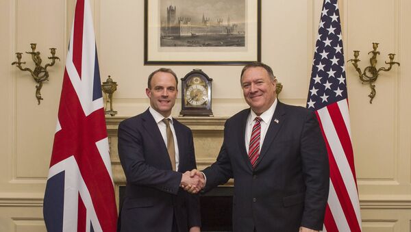 UK Foreign Secretary Dominic Raab shakes hands with US Secretary of State Mike Pompeo, right, in London, Wednesday Jan. 29, 2020. - Sputnik International