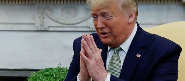 U.S. President Donald Trump gestures as he meets with Ireland's Prime Minister, Taoiseach Leo Varadkar in the Oval Office of the White House in Washington, U.S., March 12, 2020 U.S. President Donald Trump gestures as he meets with Ireland's Prime Minister, Taoiseach Leo Varadkar in the Oval Office of the White House in Washington, U.S., March 12, 2020 - Sputnik International