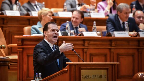 Romanian Prime Minister Ludovic Orban delivers his speech during a no-confidence vote initiated by the Social Democrat Party (PSD) at the Romanian Parliament in Bucharest on February 5, 2020 - Sputnik International