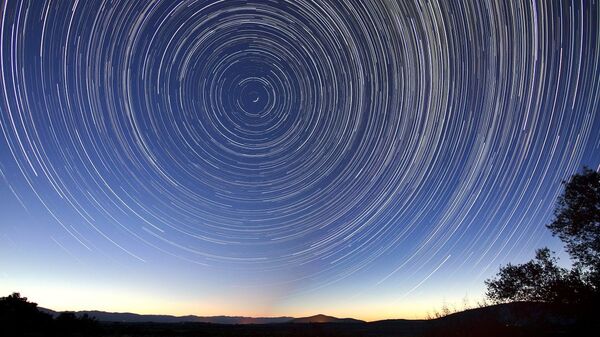  Stars appearing to whirl around Polaris - Sputnik International