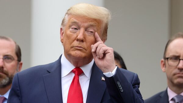 U.S. President Donald Trump pauses during a news conference where he declared the coronavirus pandemic a national emergency in the Rose Garden of the White House in Washington, U.S., March 13, 2020 - Sputnik International