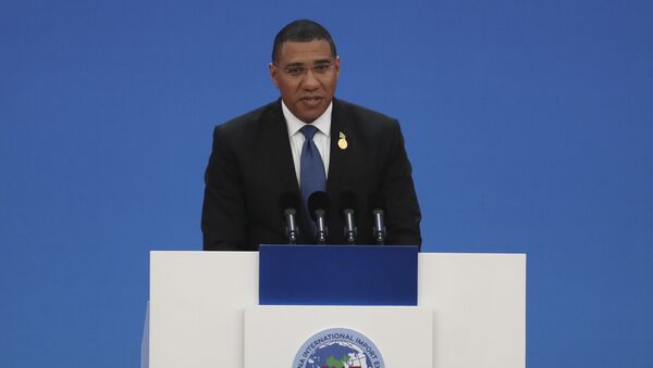 Jamaica's Prime Minister Andrew Holness delivers a speech at the opening ceremony of the China International Import Expo in Shanghai on Tuesday, Nov. 5, 2019. The sprawling import fair into its second year is meant to demonstrate China's willingness to open its domestic markets. - Sputnik International