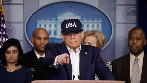 U.S. President Donald Trump holds a press briefing with members of the Coronavirus Task Force at the White House in Washington, U.S., March 14, 2020. - Sputnik International