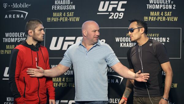 UFC president Dana White stands between fighters Tony Ferguson, right, and Khabib Nurmagomedov, of Russia, during a news conference for UFC 209, Thursday, 2 March 2017, in Las Vegas. Nurmagomedov and Ferguson are scheduled to battle in a lightweight mixed martial arts fight Saturday in Las Vegas. - Sputnik International