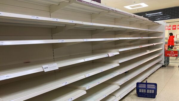 Empty shelves of pasta are seen at a supermarket, as the number of coronavirus cases grow around the world, in London, Britain March 13, 2020 - Sputnik International