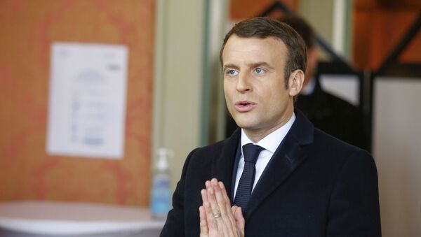 French President Emmanuel Macron gestures after voting for the first round of the mayoral elections in Le Touquet, northern France, Sunday March 15, 2020. France is holding nationwide elections Sunday to choose all of its mayors and other local leaders despite a crackdown on public gatherings because of the new virus - Sputnik International