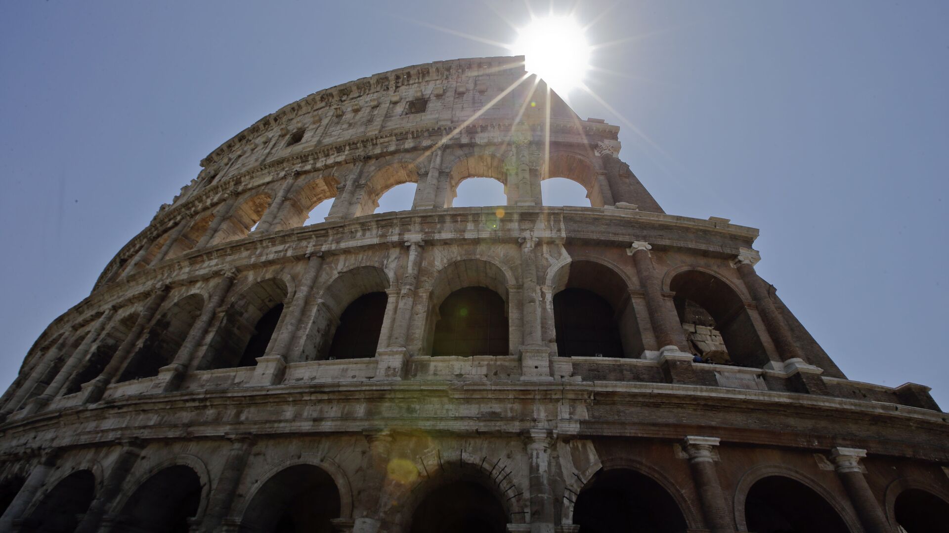 A view of the Colosseum after the first stage of the restoration work was completed in Rome, Friday, July 1st, 2016. The Colosseum has emerged more imposing than ever after its most extensive restoration, a multi-million-euro cleaning to remove a dreary, undignified patina of soot and grime from the ancient arena, assailed by pollution in traffic-clogged Rome. (AP Photo/Andrew Medichini) - Sputnik International, 1920, 03.10.2021