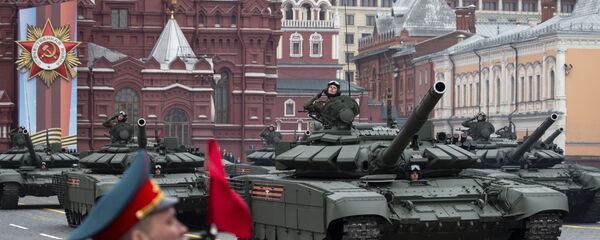 Russian tanks T-72 B3 drive during the Victory Day military parade Russian tanks T-72 B3 drive during the Victory Day military parade - Sputnik International