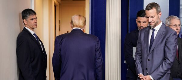 U.S. President Donald Trump departs after speaking during a news briefing on the administration's response to the coronavirus at the White House in Washington, U.S., March 15, 2020. - Sputnik International