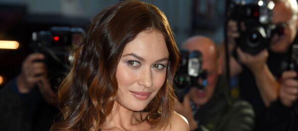 Actress Olga Kurylenko poses on the red carpet upon arrival for a special screening of the film Johnny English Strikes Again in central London on October 3, 2018. - Sputnik International