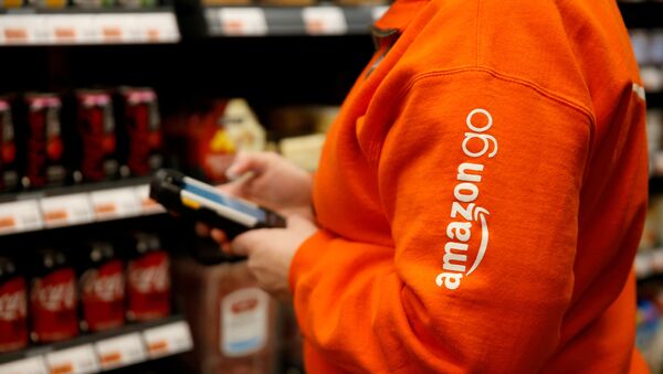 Amazon associate Cindy Umipig checks inventory at a smaller format Amazon Go store in the Blue Shift Amazon office space at 300 Pine Street in downtown Seattle, Washington, U.S., December 10, 2018 - Sputnik International
