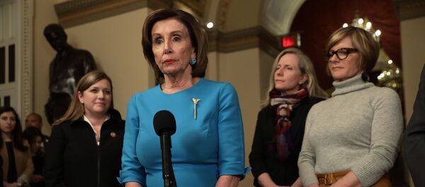U.S. Speaker of the House Rep. Nancy Pelosi (D-CA) speaks to members of the media as Rep. Lizzie Fletcher (D-TX), Rep. Abigail Spanberger (D-VA) and Rep. Susie Lee (D-NV) listen at the U.S. Capitol March 13, 2020 - Sputnik International