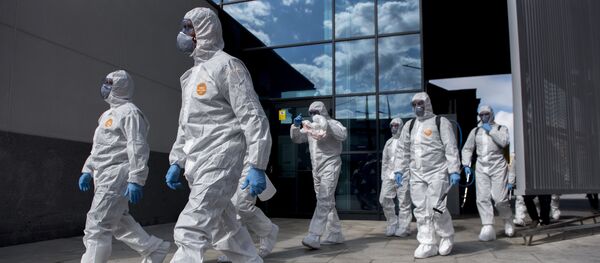 The UME (Emergency Army Unit) attend the train station in Granada, Spain Tuesday March 17, 2020 - Sputnik International