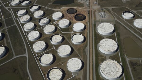 Crude oil storage tanks are seen from above at the Cushing oil hub, in Cushing, Oklahoma, March 24, 2016 - Sputnik International