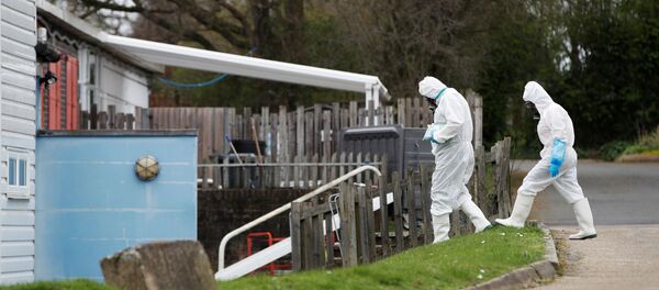 Staff from a cleaning company arrive at Parkside Community Primary School in Borehamwood as the spread of the coronavirus disease (COVID-19) continues, in Boreham Wood, Britain, March 18, 2020. - Sputnik International