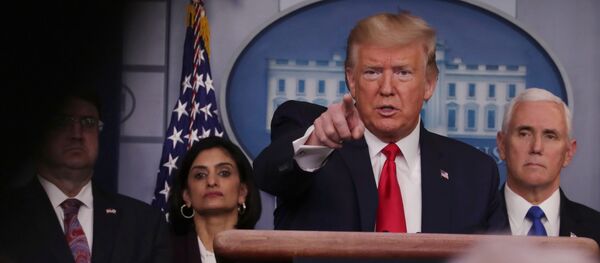US President Donald Trump answers a question during the daily White House coronavirus response briefing with members of the administation's coronavirus task force at the White House in Washington, US, March 18, 2020 - Sputnik International