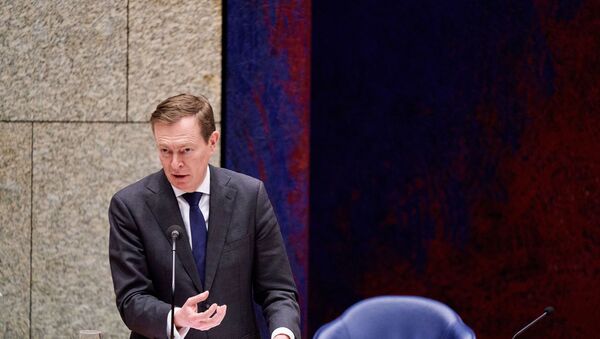 Dutch Minister Bruno Bruins for Medical Care (VVD) speaks during a debate about the developments surrounding the coronavirus, in The Hague, the Netherlands, on March 18, 2020.  - Sputnik International