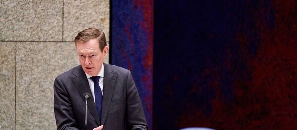 Dutch Minister Bruno Bruins for Medical Care (VVD) speaks during a debate about the developments surrounding the coronavirus, in The Hague, the Netherlands, on March 18, 2020.  - Sputnik International