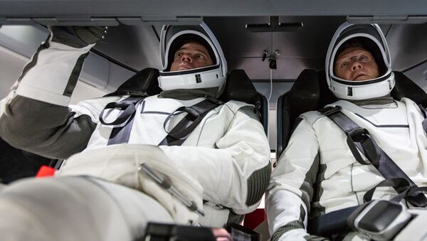 NASA astronauts Doug Hurley and Bob Behnken familiarise themselves with SpaceX’s Crew Dragon, the spacecraft that will transport them to the International Space Station as part of NASA’s Commercial Crew Program. Their upcoming flight test is known as Demo-2, short for Demonstration Mission 2. The Crew Dragon will launch on SpaceX’s Falcon 9 rocket from Launch Complex 39A at NASA’s Kennedy Space Center in Florida. - Sputnik International