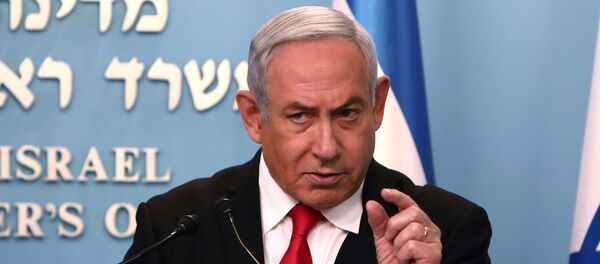 Israeli Prime Minister Benjamin Netanyahu gestures as he delivers a speech at his Jerusalem office, regarding the new measures that will be taken to fight the coronavirus, March 14, 2020 - Sputnik International
