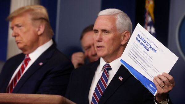 U.S. President Donald Trump and Secretary of State Mike Pompeo listen as Vice President Mike Pence addresses the Trump administration's daily coronavirus task force briefing while holding up a chart reading 15 Ways to Slow the Spread at the White House in Washington, U.S., March 20, 2020 - Sputnik International