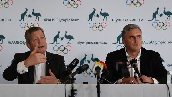 Australian Olympic Committee Chief Executive Matt Carroll (L) and Australian Team Chef de Mission for Tokyo 2020 Ian Chesterman address the media during a press conference regarding the coronavirus disease (COVID-19) in Sydney, Australia, March 19, 2020. Picture taken March 19, 2020 - Sputnik International