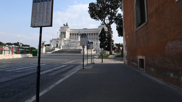Piazza Venezia in Rome is seen deserted as Italians stay home as part of a lockdown against the spread of coronavirus disease (COVID-19) in Rome, Italy March 22, 202 - Sputnik International