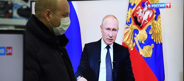 Vladimir Putin addresses the nation on additional measures on Russia's fight against the coronavirus. - Sputnik International