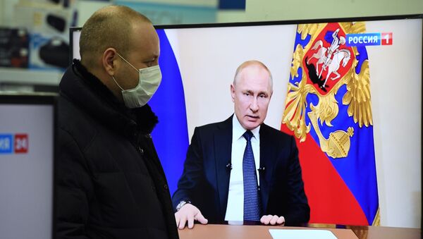 Vladimir Putin addresses the nation on additional measures on Russia's fight against the coronavirus. - Sputnik International