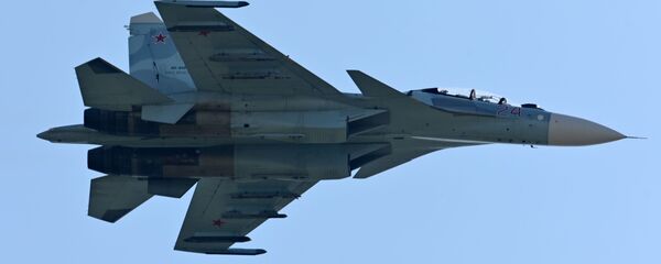 An Su-27 airplane during demonstration performances at the exhibition of weapons and military equipment in Rostov-on-Don. - Sputnik International