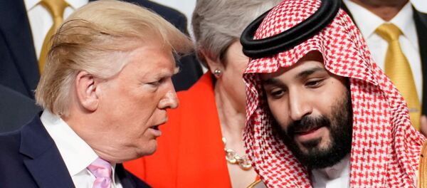 U.S. President Donald Trump speaks with Saudi Arabia's Crown Prince Mohammed bin Salman during family photo session with other leaders and attendees at the G20 leaders summit in Osaka, Japan, June 28, 2019. U.S. President Donald Trump speaks with Saudi Arabia's Crown Prince Mohammed bin Salman during family photo session with other leaders and attendees at the G20 leaders summit in Osaka, Japan, June 28, 2019. - Sputnik International