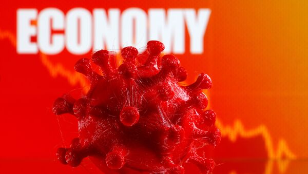 A 3D-printed coronavirus model is seen in front of a stock graph and the word Economy on display in this illustration taken March 25, 2020.  - Sputnik International