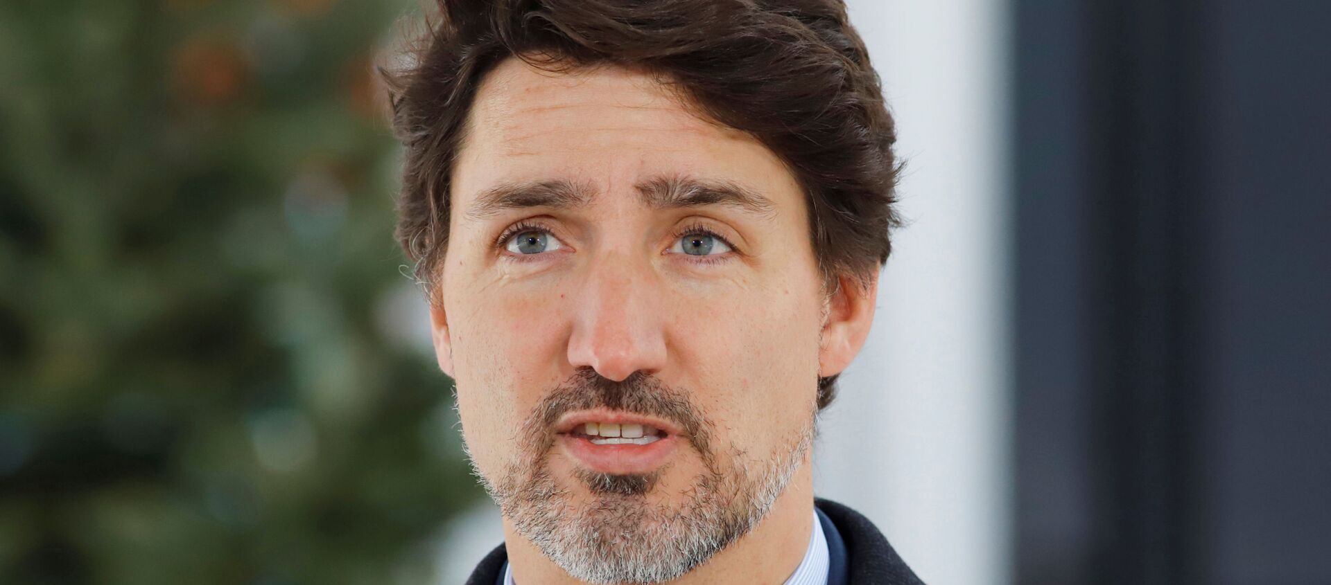 Canada's Prime Minister Justin Trudeau speaks to news media outside his home in Ottawa, Ontario, Canada March 25, 2020.  - Sputnik International, 1920, 26.03.2020