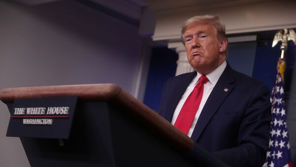 U.S. President Donald Trump leads the daily coronavirus response briefing at the White House in Washington, U.S. March 26, 2020 - Sputnik International
