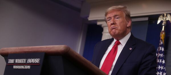 U.S. President Donald Trump leads the daily coronavirus response briefing at the White House in Washington, U.S. March 26, 2020 - Sputnik International