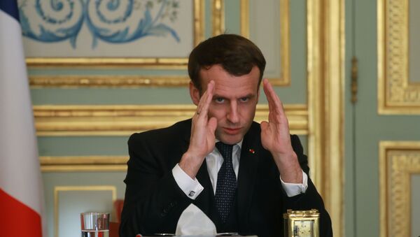 French President Emmanuel Macron gestures during a conference call to install the CARE committee on the novel coronavirus (COVID-19), at the Elysee Palace in Paris, France March 24, 2020. - Sputnik International
