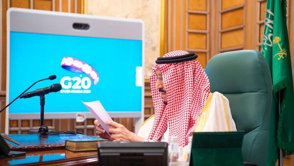 Saudi King Salman bin Abdulaziz speaks via video link during a virtual G20 summit on coronavirus disease (COVID-19), in Riyadh, Saudi Arabia March 26, 2020. - Sputnik International